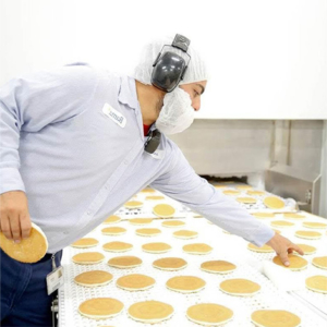 Making pancakes on a conveyor belt